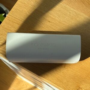 Sunglasses case holder